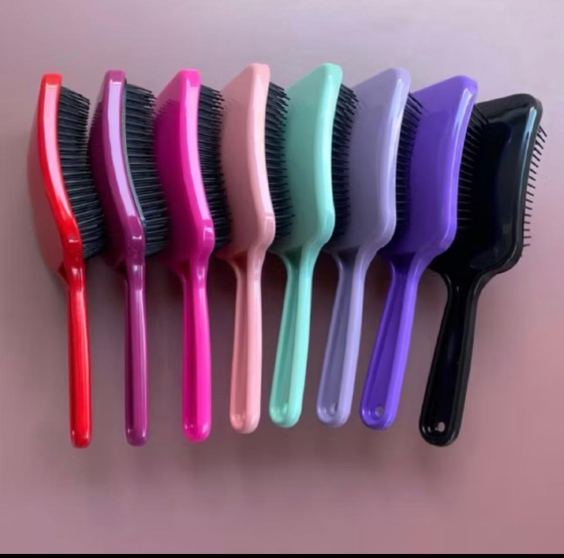 Produto: ESCOVA RAQUETÃO CORES